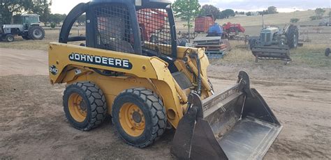 john deere 240 skid steer hydraulic fluid|john deere 240 loader specs.